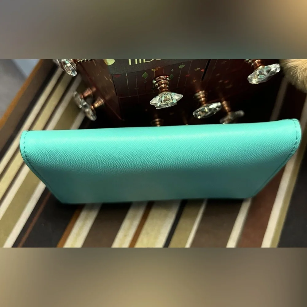 Kate Spade Turquoise/light blue Monday “Share your last piece of gum” Crossbody